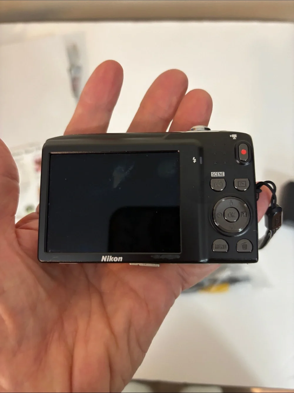 Nikon Coolpix S3100 camera with charger box and everything shown